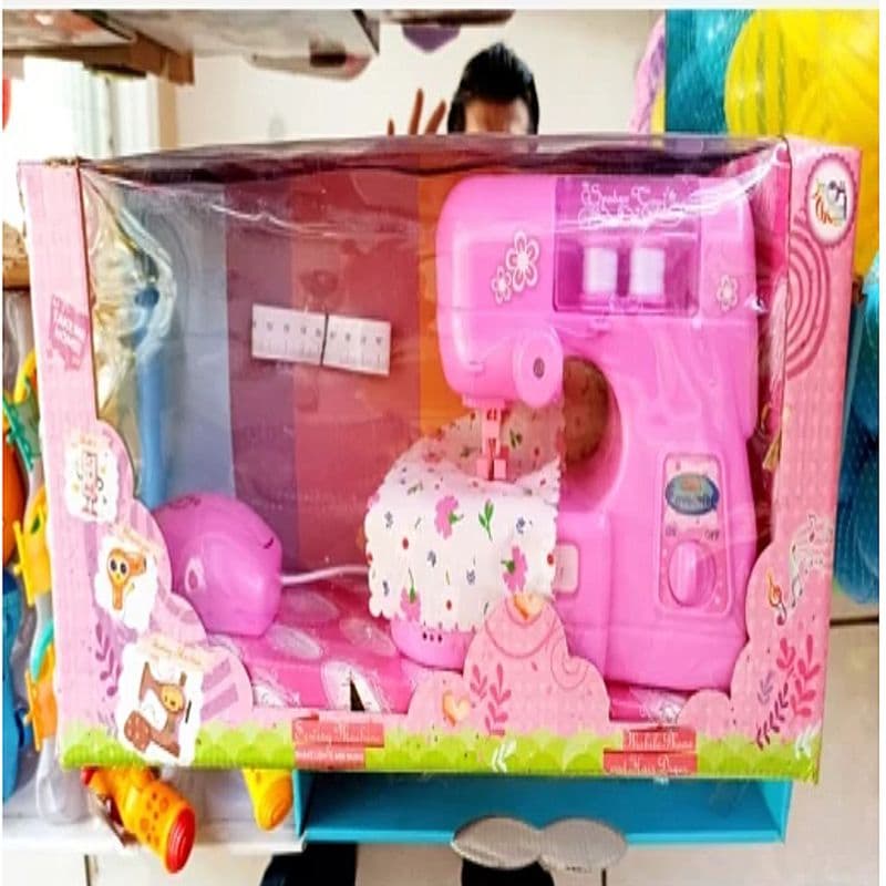 اسباب بازی چرخ خیاطی باتری خور